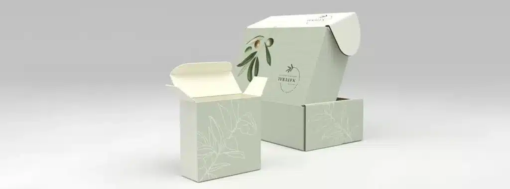 A box featuring a green leaf design, representing eco-friendly secondary packaging